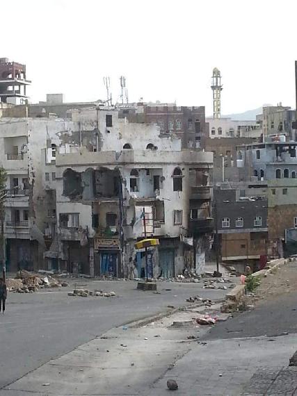 Mixed residential / commercial building destroyed in Taiz